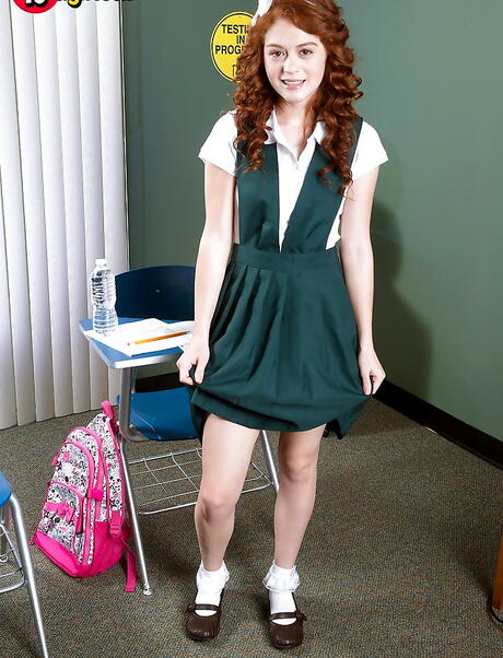 Excellent american redheaded teen Alice Green in uniform unveils tiny tits and pussy 
