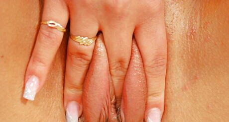 Enchanting babe Justine showing big titties and toying her twat 